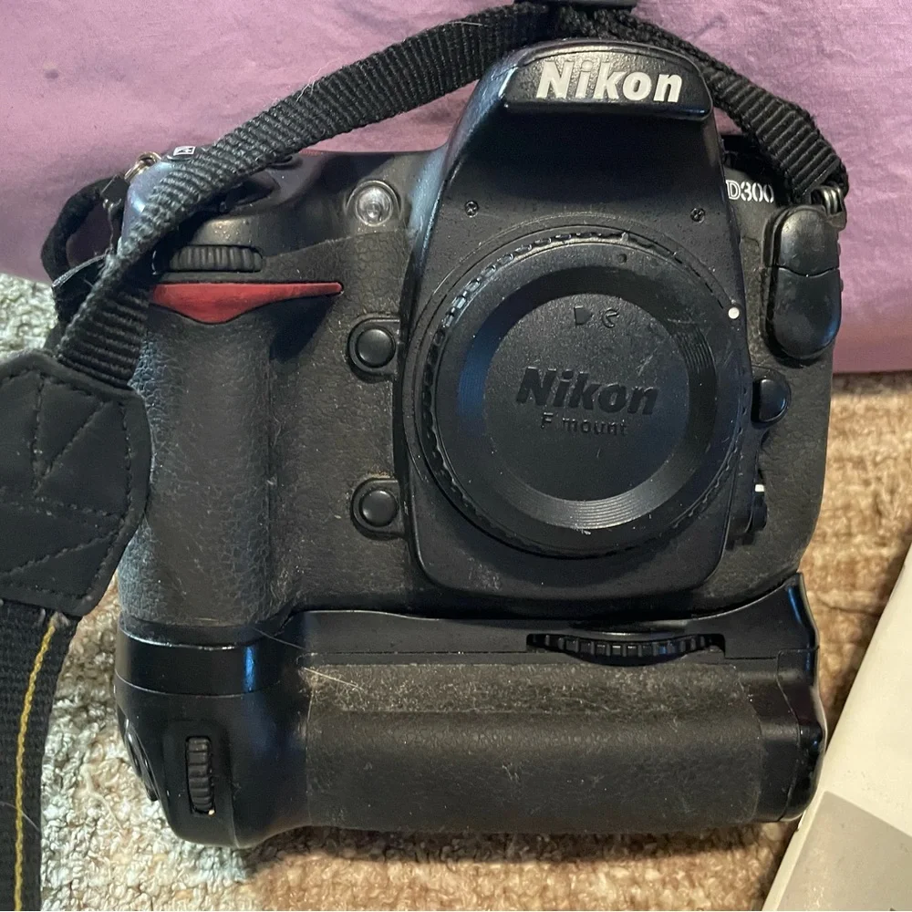 Nikon D300 DSLR camera body with MB-D10 battery grip